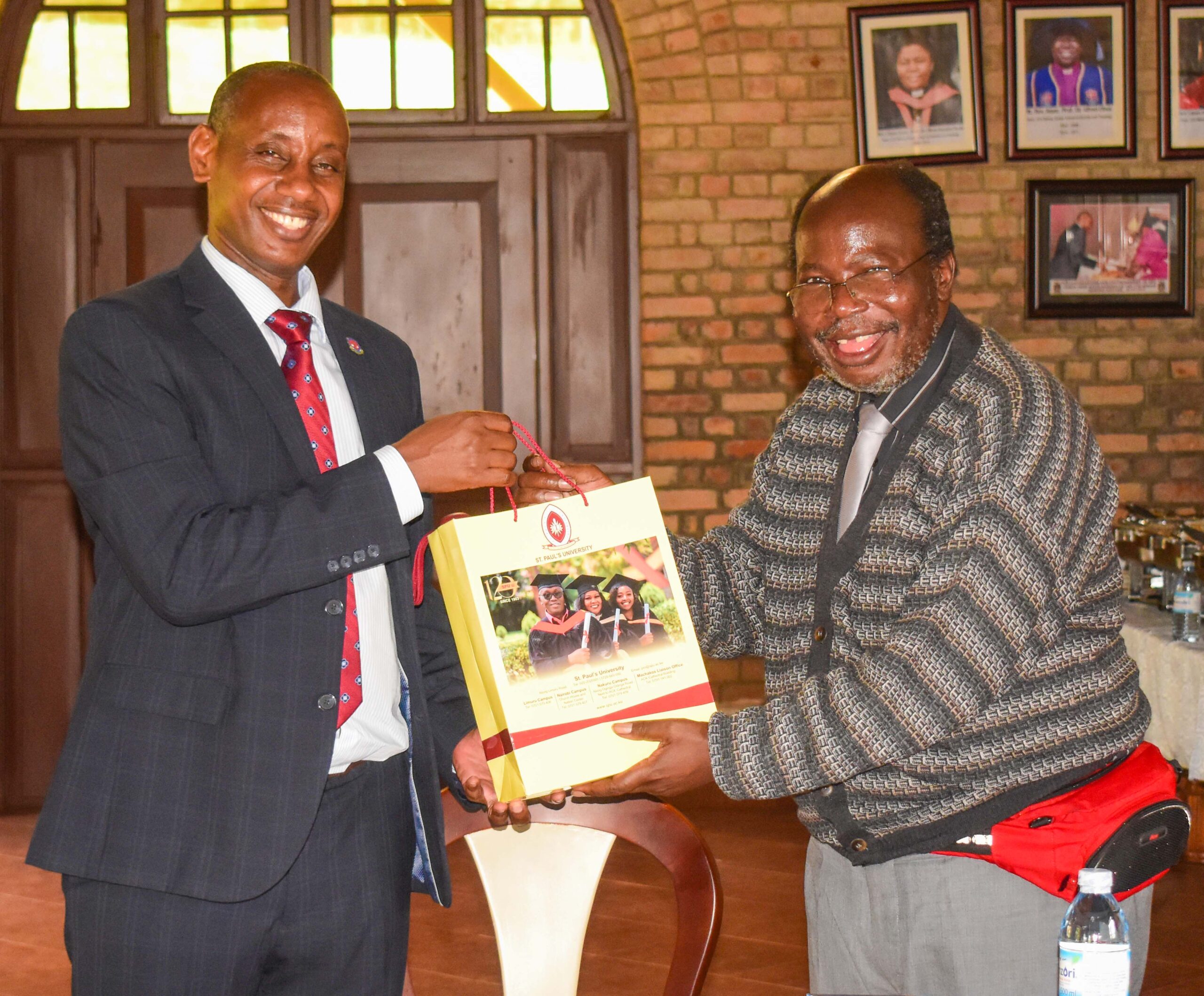 university Vice Chancellors exchange gifts